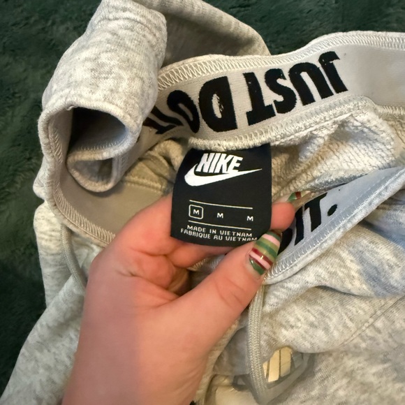 Grey Nike sweatpants with drawstring waist (minor tears pictured) - Picture 3 of 6